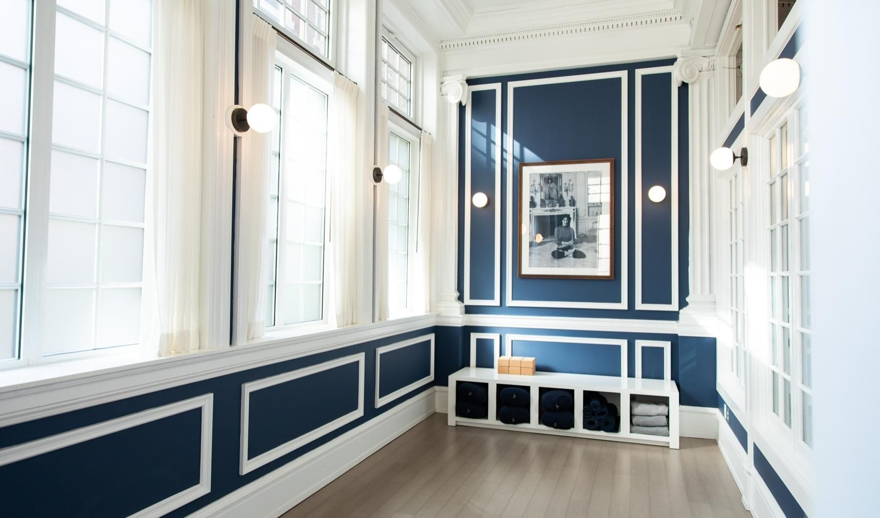 State-of-the-art amenities a room with a blue wall and a window